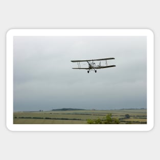 Vintage Tiger Moth aircraft on approach to land to a Norfolk airfield, UK Sticker